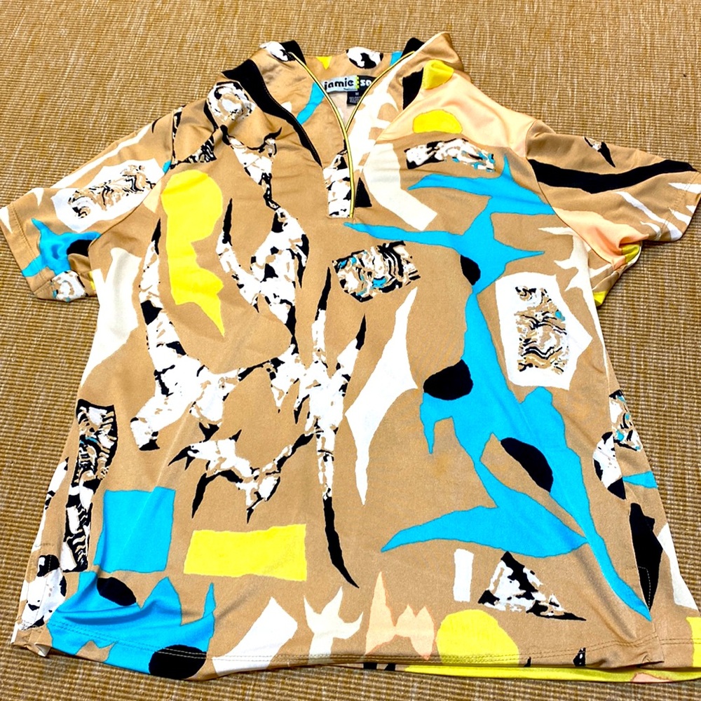 Women’s top, 84% polyester 16% spandex